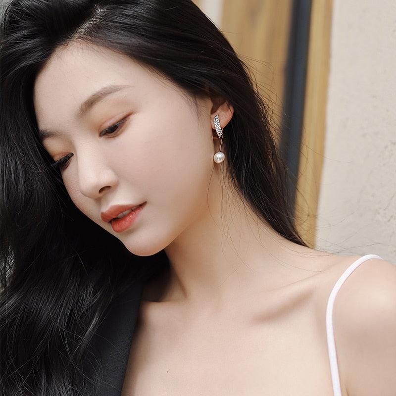 Boucles d'oreilles géométriques avec perles