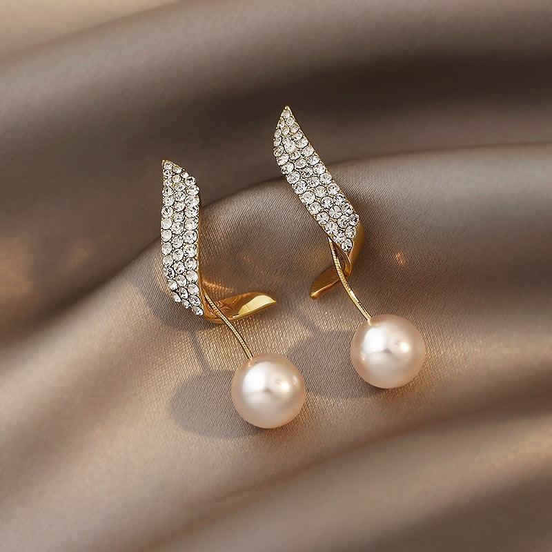 Boucles d'oreilles géométriques avec perles