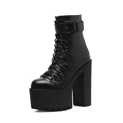 "Chaussures moto femme : bottines en cuir avec talons hauts et boucles métalliques" black