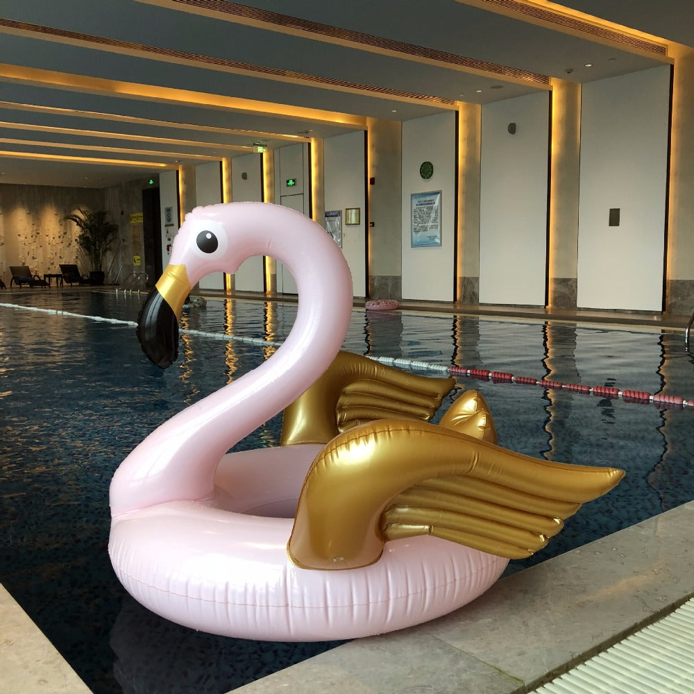 Giant flamingo with golden wings