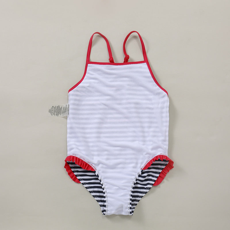 "Maillot de bain une pièce rayé pour enfant - volants bleu foncé"
