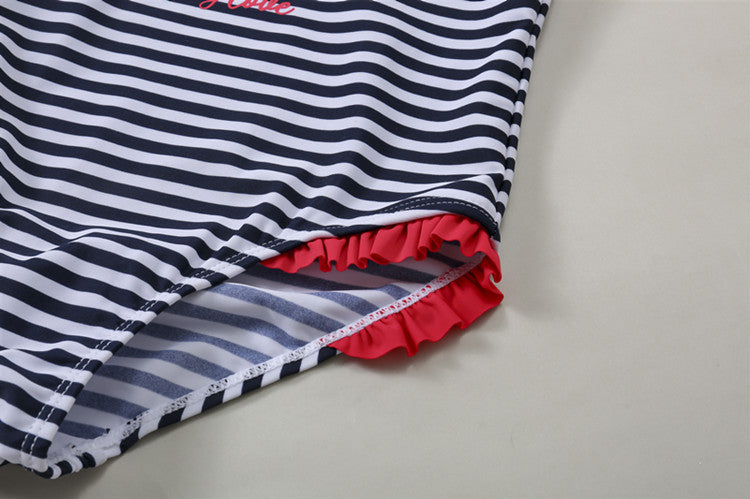 "Maillot de bain une pièce rayé pour enfant - volants bleu foncé"