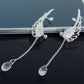 Boucles d'oreilles pendantes bohème avec ailes d'ange et cristaux