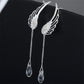 Boucles d'oreilles pendantes bohème avec ailes d'ange et cristaux