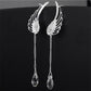 Boucles d'oreilles pendantes bohème avec ailes d'ange et cristaux