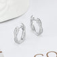 Boucles d'oreilles pour femmes classiques à anneaux torsadés avec zircons cubiques