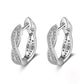 Boucles d'oreilles pour femmes classiques à anneaux torsadés avec zircons cubiques