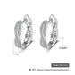Boucles d'oreilles pour femmes classiques à anneaux torsadés avec zircons cubiques