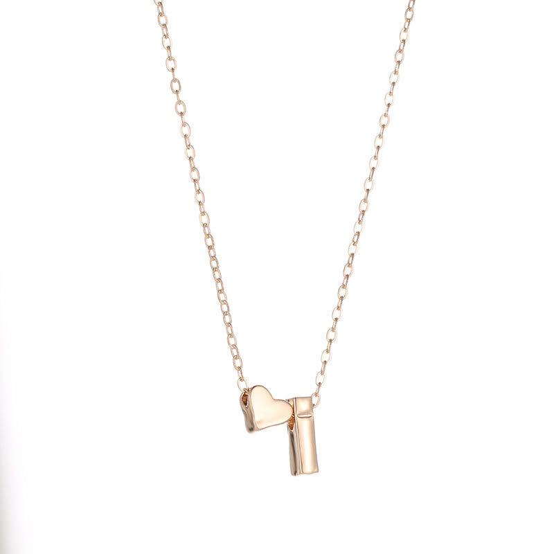 Collier initiale cœur minimaliste pour femme